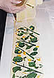 fold -pasta sheet over herbs - nasturtiums add a peppery flavour to fresh pasta
